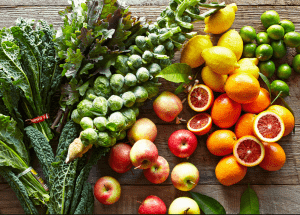 a group of fruits and vegetables on a wood surface Healthy Weight Loss Diets Liberton